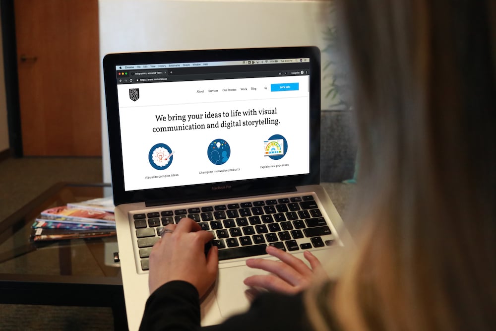 Girl looking at website homepage