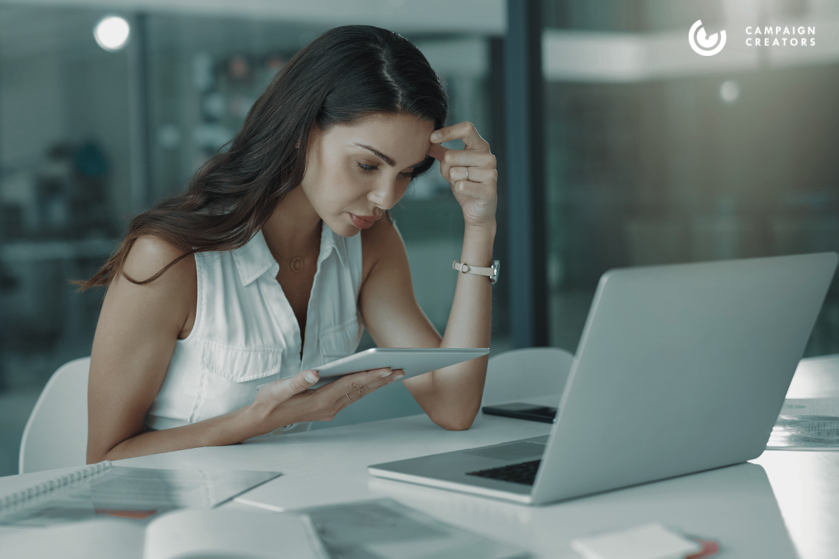 woman-reviewing-duplicate-properties-in-hubspot-crm