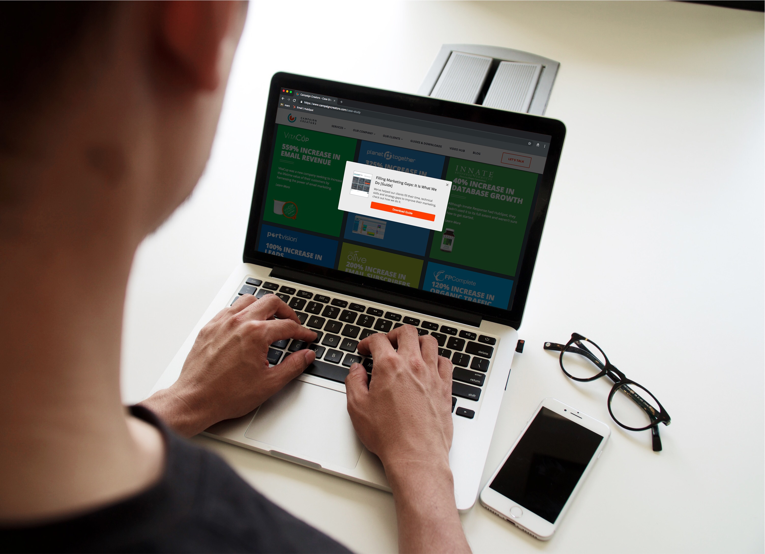 Customer viewing a website pop-up on a laptop