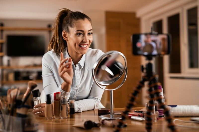 Woman reviews makeup products on live stream